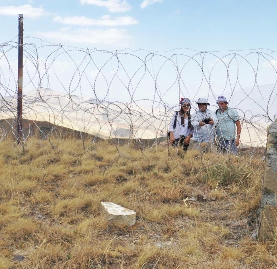 A drone photo from Iran looking back at us in Turkey with a Turkish archaeologist and an official from the Ministry of Culture and Tourism. The military base commander and the 4 soldiers with him stood out of view. The right edge of the photo shows the edge of border marker #65 which is the one Ron documented that had the boat-like and bird-like symbols carved on them that he associated with the original landing site of Noah’s ark. The full photos will be released in our final report.